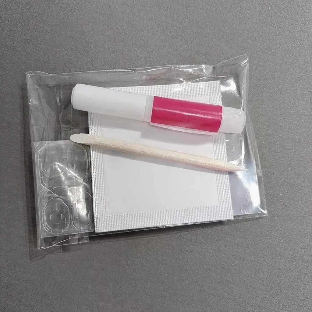 Prisegamų nagų įrankių rinkinys su lipniais tabais, dilde ir valikliu
